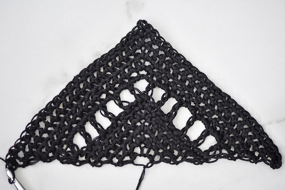 Instructions for the Fade Away Shawl crochet pattern by The Turtle Trunk