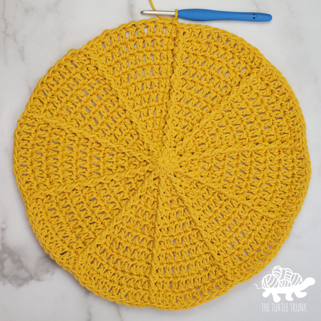 Round 11 of the Hello Sunshine Placemat crochet pattern by The Turtle Trunk.