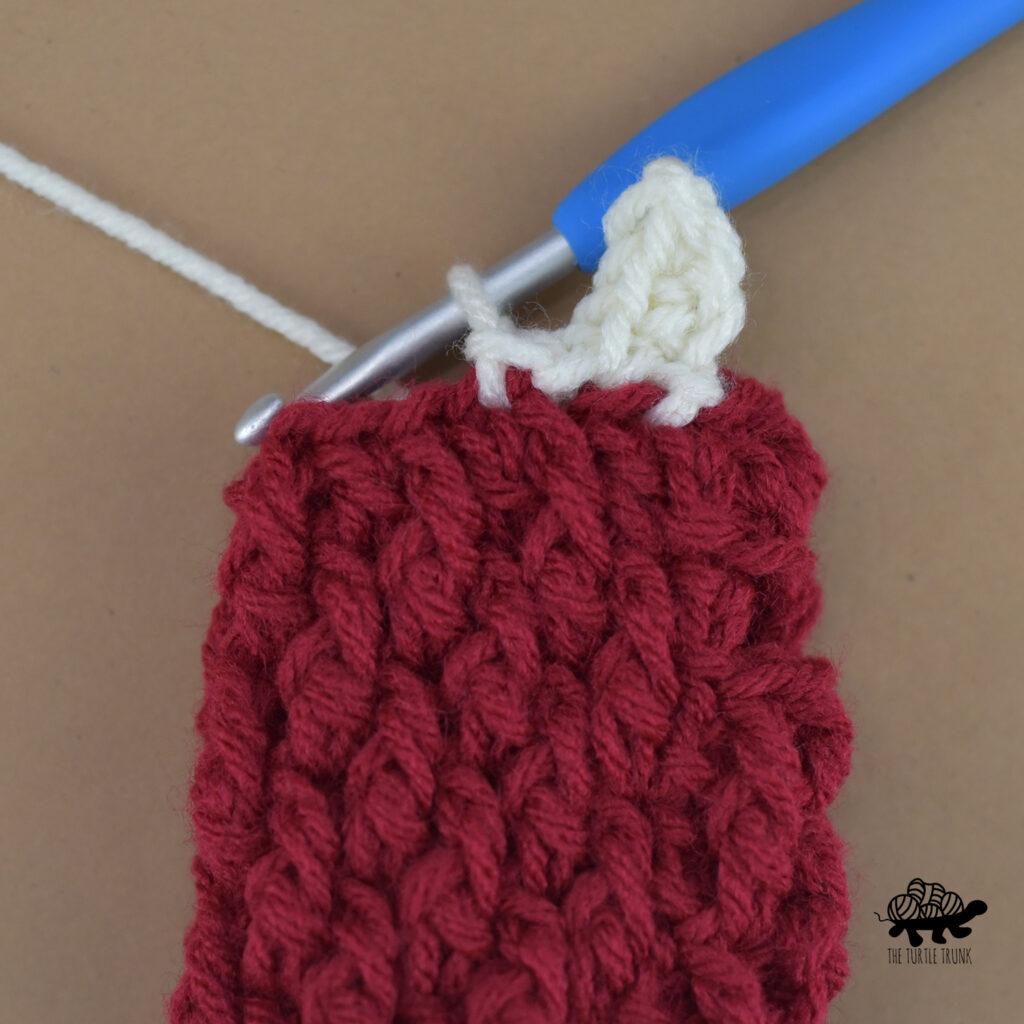 Photo shows the cuff on the mini Country Cottage Mitten.