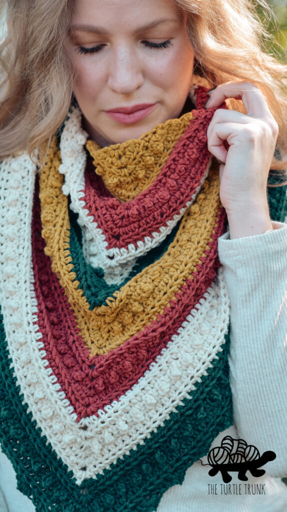 Photos show a woman wearing a striped, crochet, triangle scarf.