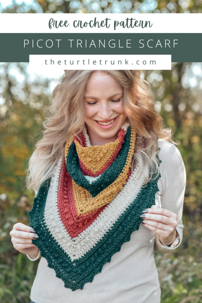 Pinterest Pin for the Picot Triangle Scarf crochet pattern by The Turtle Trunk. Photo shows a woman wearing a striped, crochet triangle scarf.