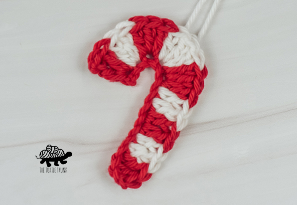 A crochet candy cane applique.