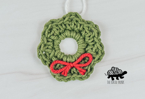 A crochet wreath applique.