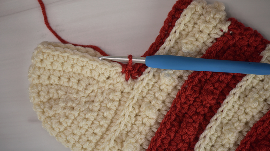 Single crochet 2 together to join the heel to the body.