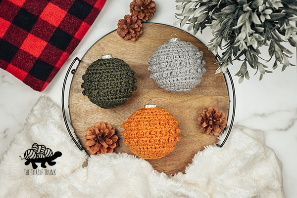 3 crochet Christmas tree ornaments.